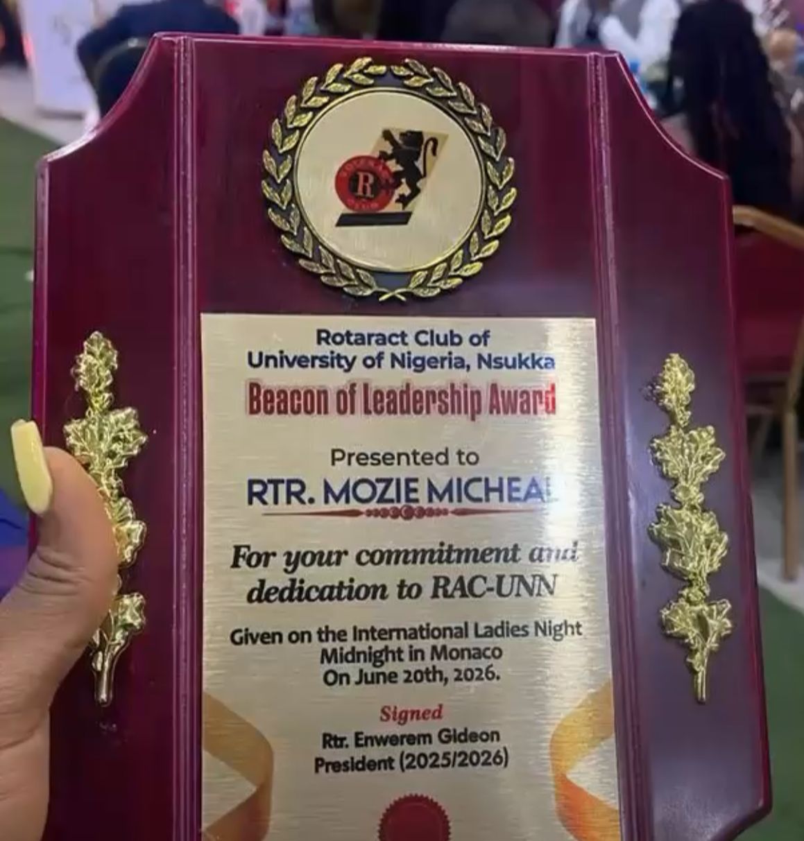 Beacon of Leadership Award plaque presented to Rtr. Mozie Micheal